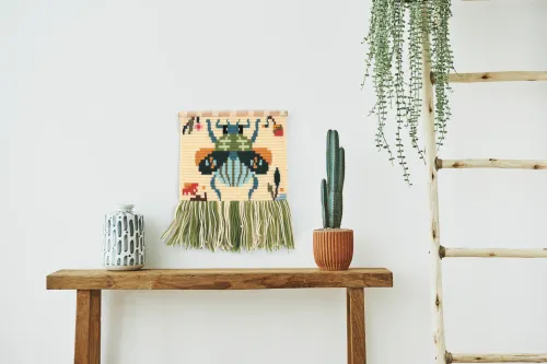 Borduurpakket Scarabee – DIY wanddecoratie verhouding
